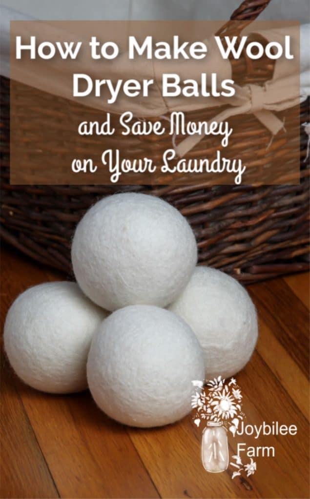wool dryer balls in front of a wicker laundry basket