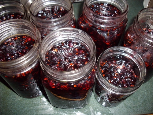 Jam jars ready for processing.