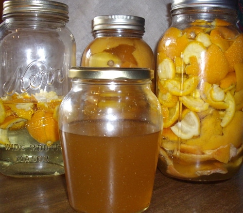 citrus cleaner and citrus peels in jars