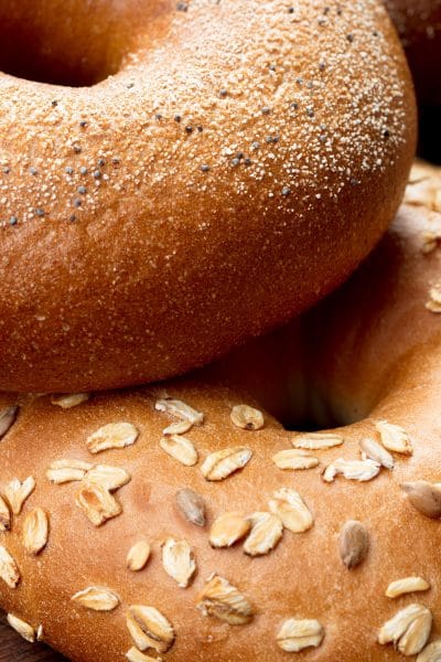 A close up of multigrain and seeded bagels