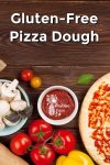 Pizza dough and ingredients on a wooden background