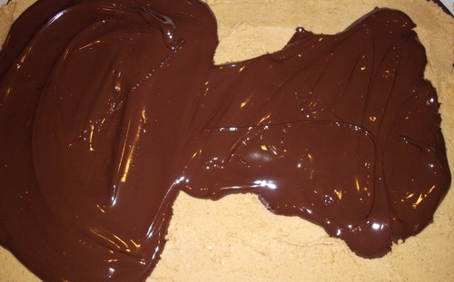 Buckeye recipe in progress bark base with chocolate, melted.
