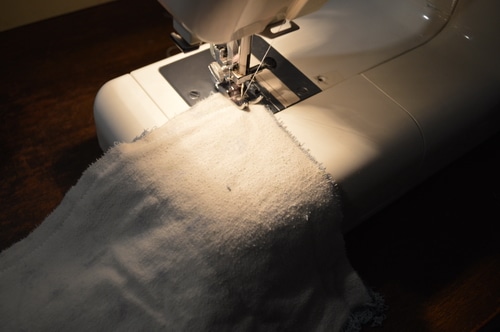 Sewing flannel to towels to make cloth paper towel alternatives