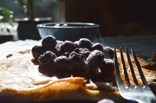blueberries on top of sourdough pancakes