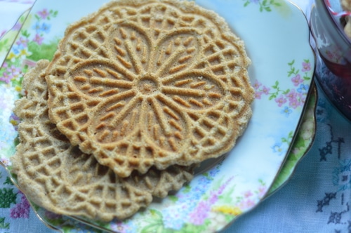 Ginger is a prime digestive. It stokes the inner fire and warms up sluggish digestion, which makes you feel better. Ginger pizzelles are good for upset stomachs and nausea, too. Or just enjoy them as a light snack at any time of day.