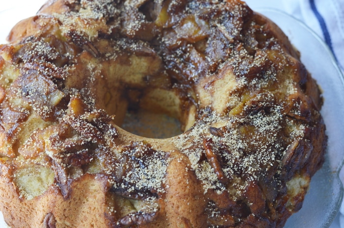 I made up this Maple Apple Bundt Cake to use up the last of our storage of golden delicious apples. If you’ve got apples from last fall’s harvest they will be soft and somewhat shrivelled on the first day of spring. This is the perfect use for those kinds of apples. In fact, my friends were picking the baked apple pieces off the top of the cake while they were waiting for dessert to be served. Win-Win!