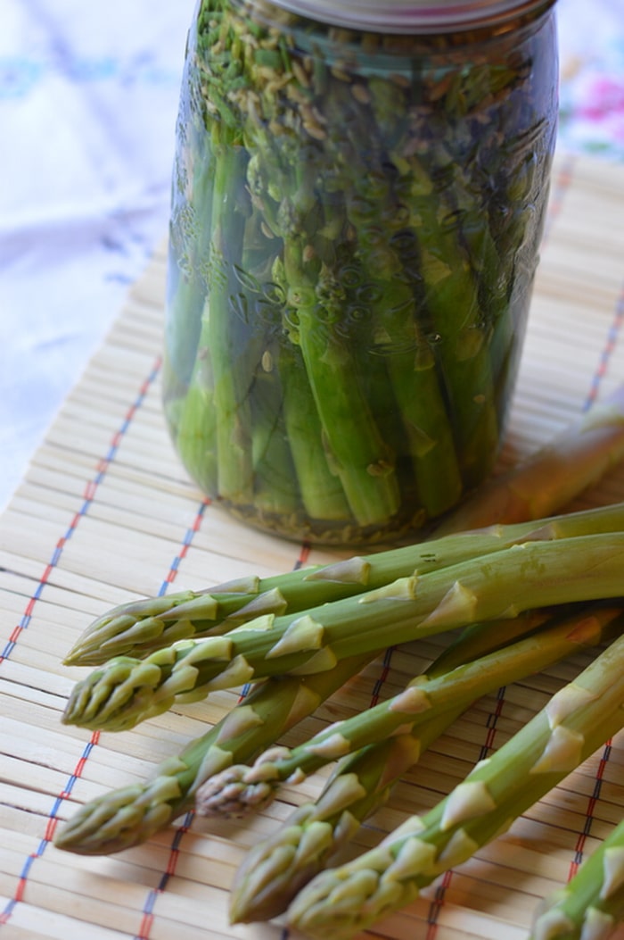 This recipe will give you tangy pickled asparagus with a crunch.  Crunchy, lacto-fermented asparagus is a better filling for fancy tea sandwiches and a nicer addition to the pickle tray.  This is what asparagus was made for.