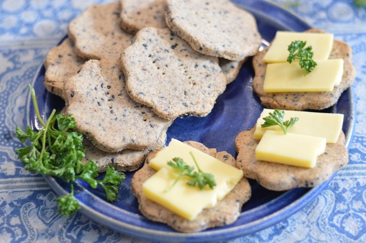 Easy Gluten-Free Cracker Recipe that tastes great and looks great on the plate and is firm enough to be used as the base for appetizers.
