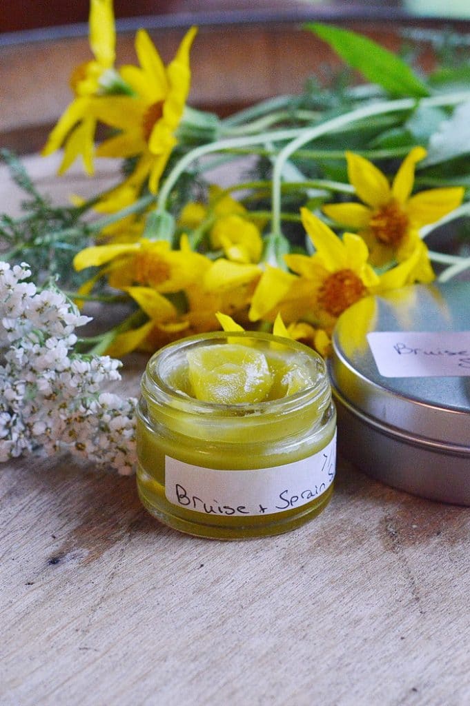 jar of arnica and yarrow ointment