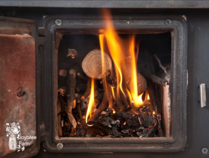 fire burning in a wood-stove