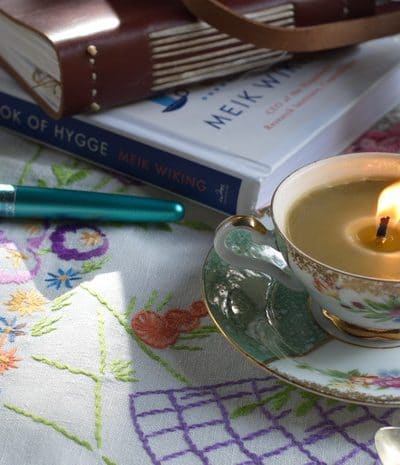 Teacup candle on a table