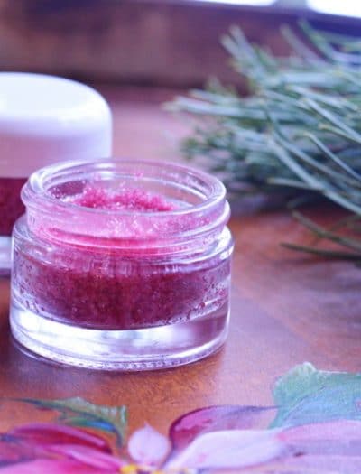 diy lip scrub with pink mica pigment in a half ounce plastic container