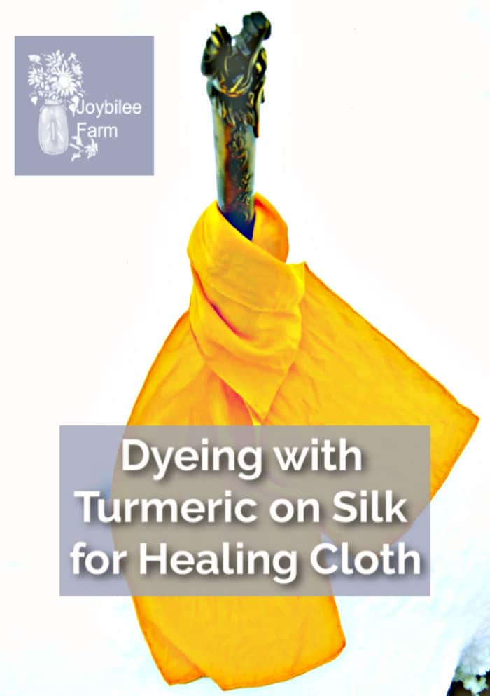 turmeric dyed silk scarf wrapped around a katana