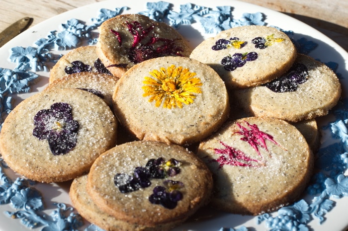 gluten free edible flower cookies on a tray