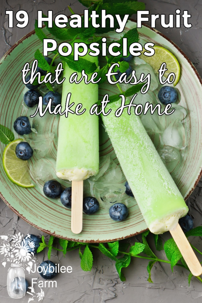 lime, mint, and blueberry popsicles in a ceramic bowl