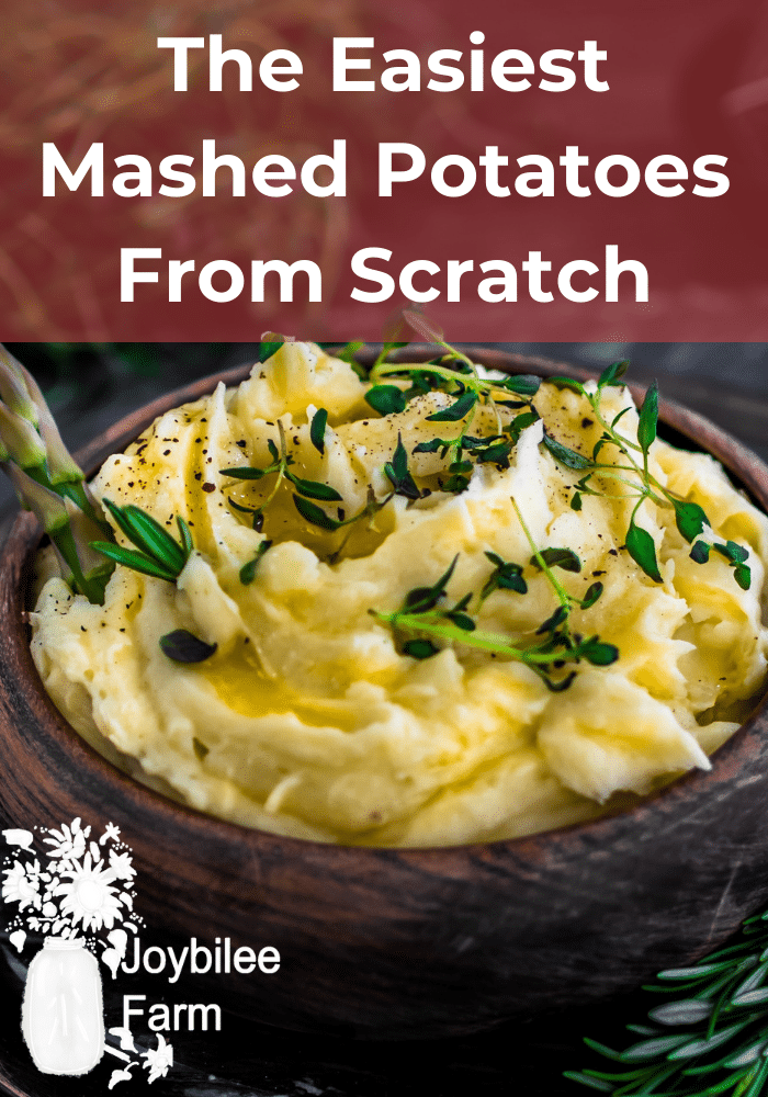 mashed potatoes with green herb topping in a bowl